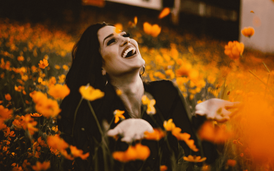 Happy-Woman-in-the-Flower-Field